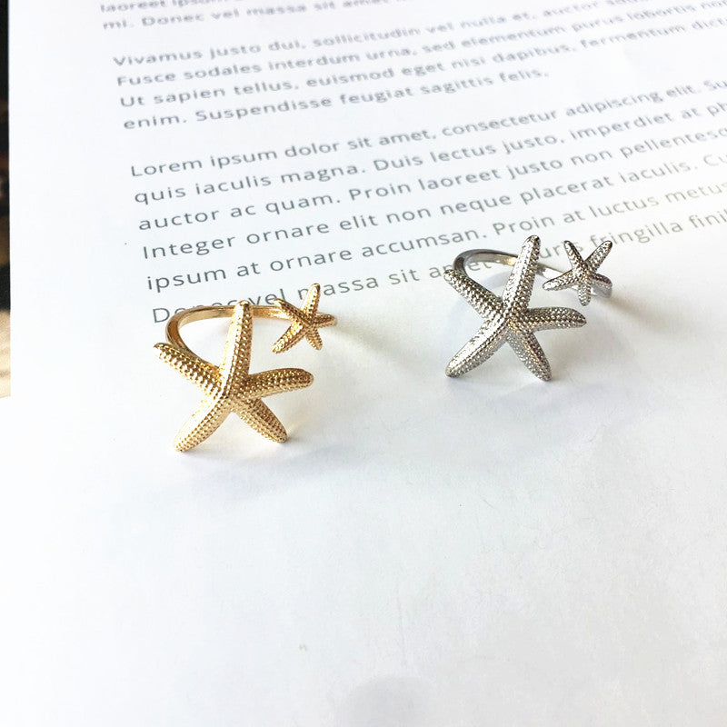 Eleganter verstellbarer Ring im Seestern-Design aus edlem Silber und Gold