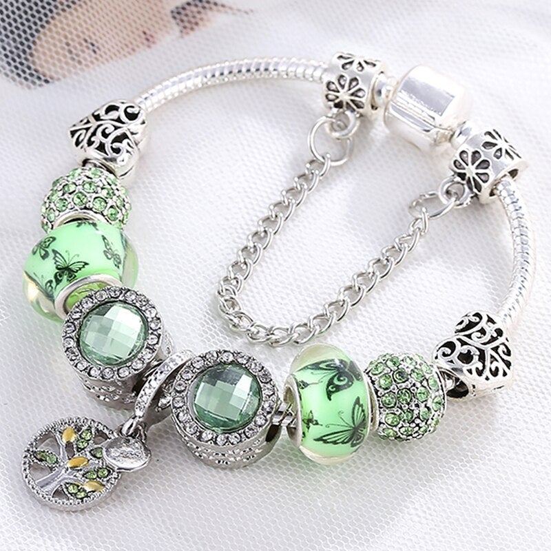 Elegantes Armband aus Sterling Silber mit funkelndem grĂŒnem Kristall