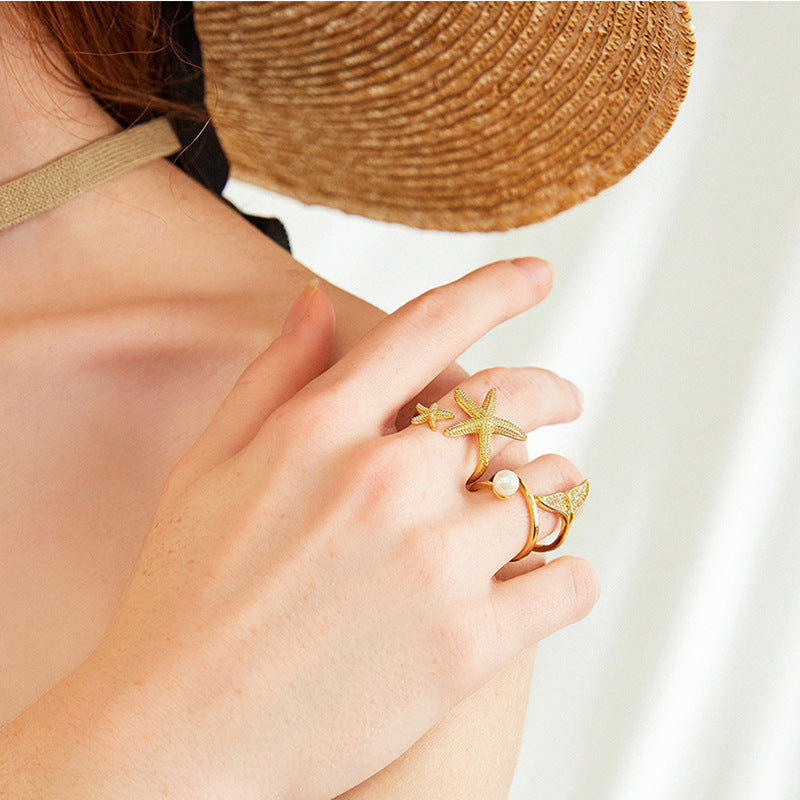 Eleganter verstellbarer Ring im Seestern-Design aus edlem Silber und Gold