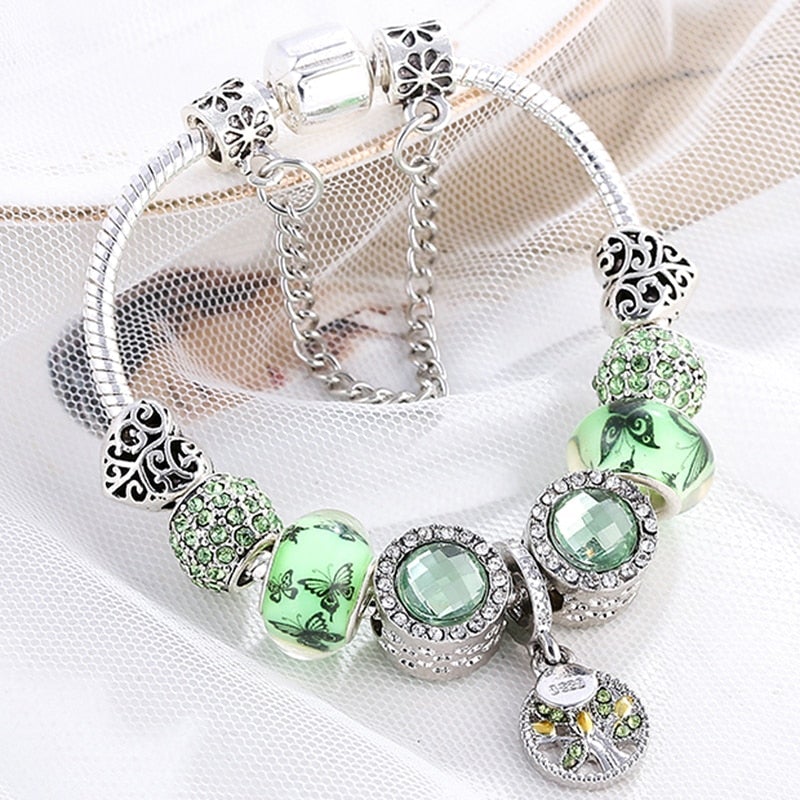 Elegantes Armband aus Sterling Silber mit funkelndem grĂŒnem Kristall