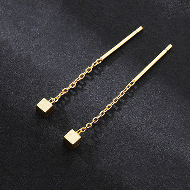 Elegante kubische Baumelohrringe für einen Hauch von Glamour