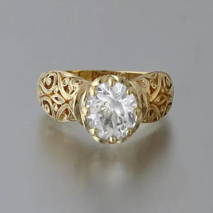 Stylischer Ring mit funkelndem weißen Kristall