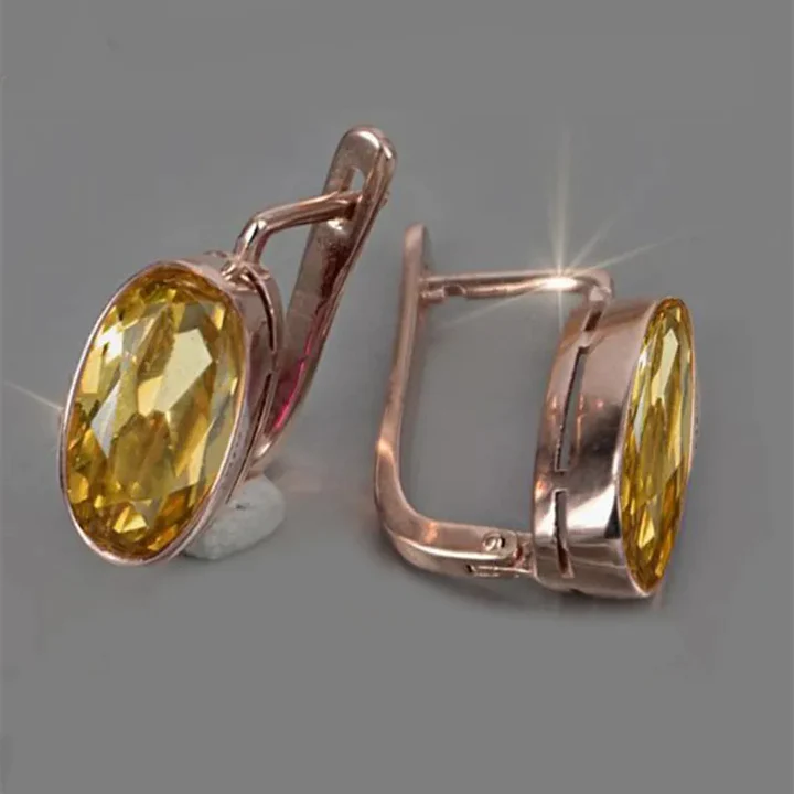 Elegante Vintage-Roségold-Ohrringe mit strahlenden gelben Kristallen