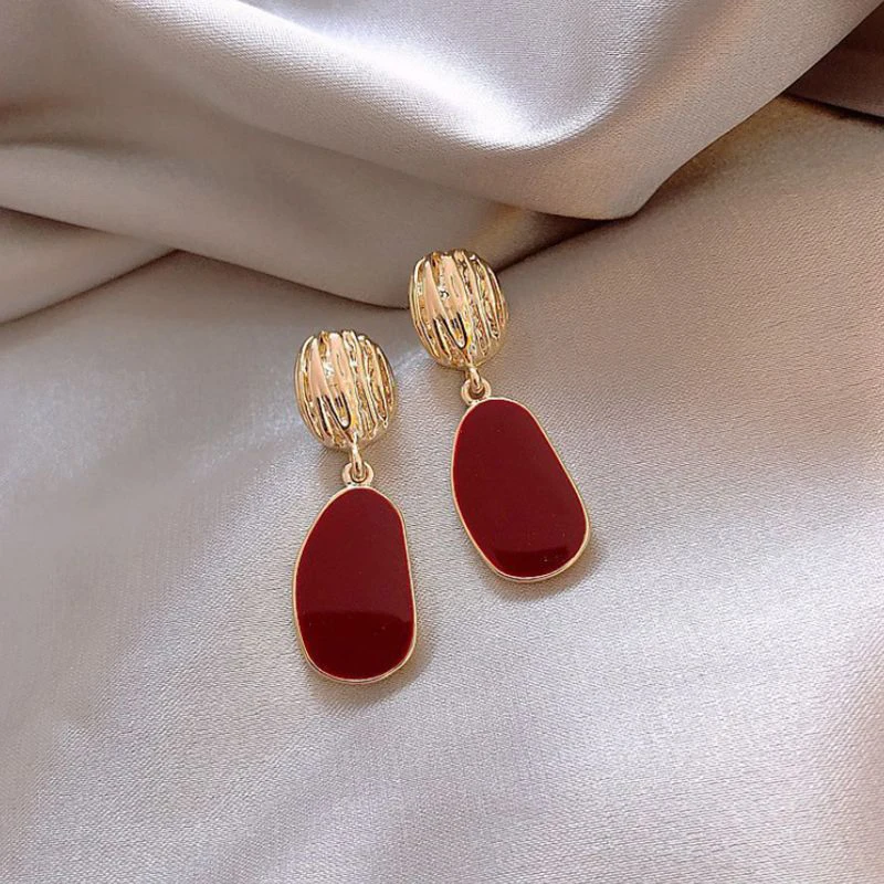 Faszinierende goldene und rote Eleganz-Ohrhänger