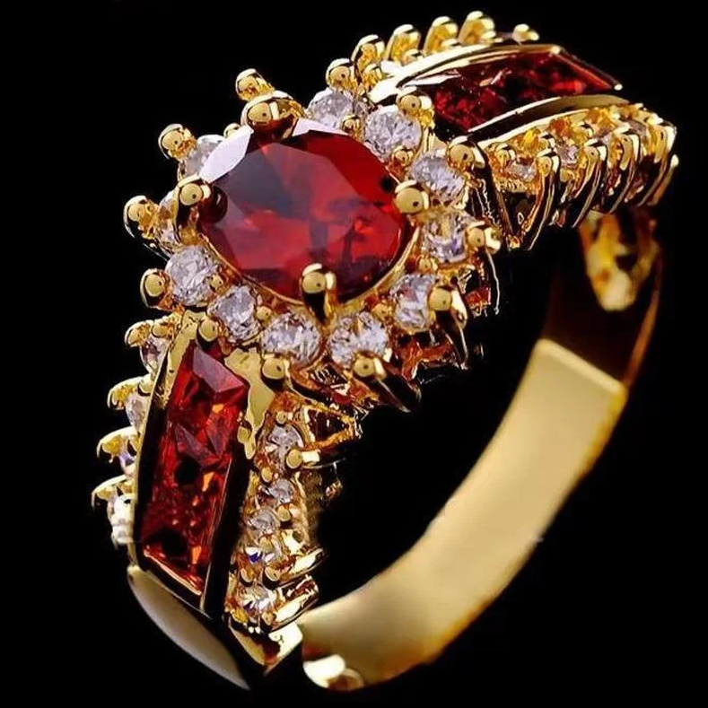 Vintage Brillantgoldring mit einem strahlenden roten Stein