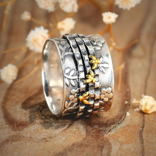 Zarter Ring mit Bienenblüten-Design