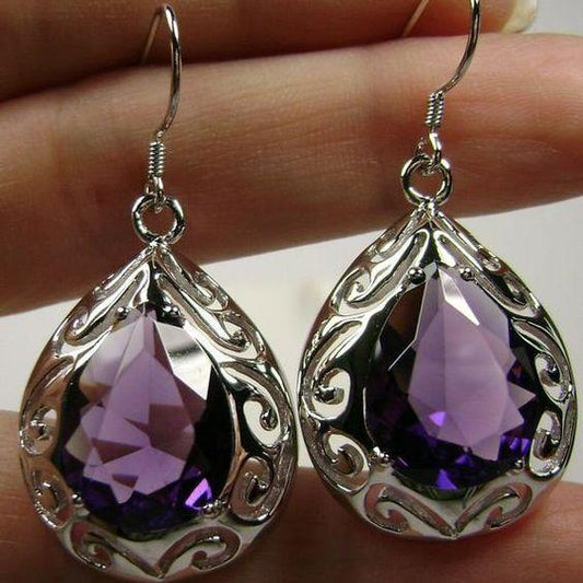Elegante Vintage-Silberohrringe mit schimmerndem violettem Kristalltropfen