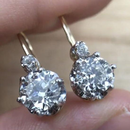 Elegante Vintage-Platin-Ohrringe mit strahlenden Zirkonia-Steinen