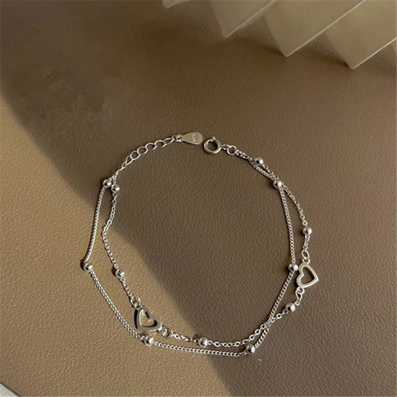 Elegantes verstellbares Herzarmband aus hochwertigem Silber