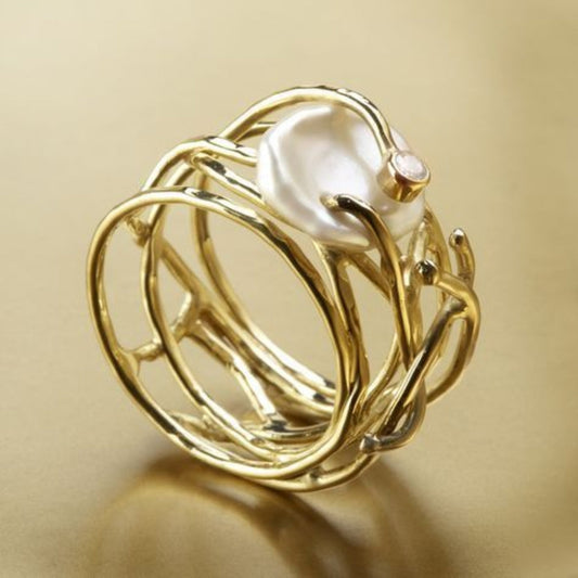 Eleganter Vintage-Goldring mit feinen Perlenakzenten