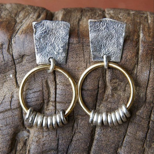 Klassische Eleganz: Vintage-Ohrringe aus Gold und Silber