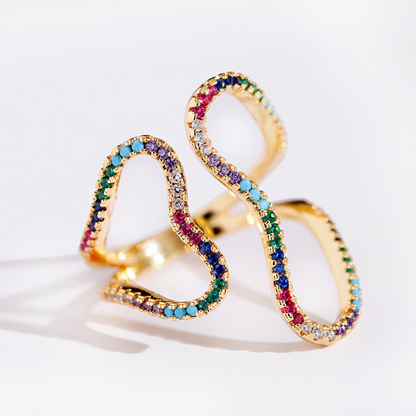 Eleganter verstellbarer Ring mit funkelnden Zirkoniasteinen in lebendigen Farben, 18 Karat vergoldet