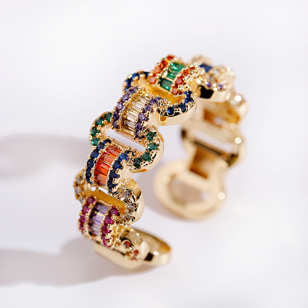 Eleganter verstellbarer 18K Goldring besetzt mit bunten Zirkoniasteinen