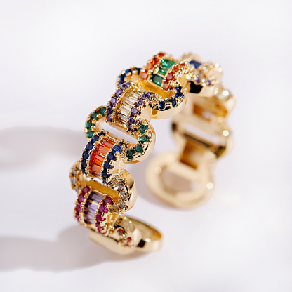 Eleganter verstellbarer 18K Goldring besetzt mit bunten Zirkoniasteinen