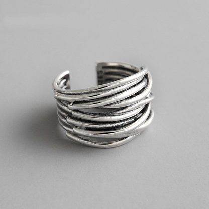Contemporary Adjustable Wide Ring with a Stylish Twist