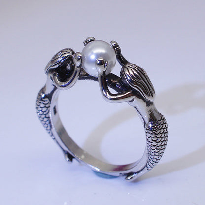 Silberner Meerjungfrau-Ring mit eleganten Perlenakzenten