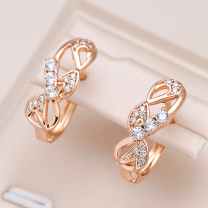 Glitzernde Kristall-Ohrringe mit eleganter Goldschleife