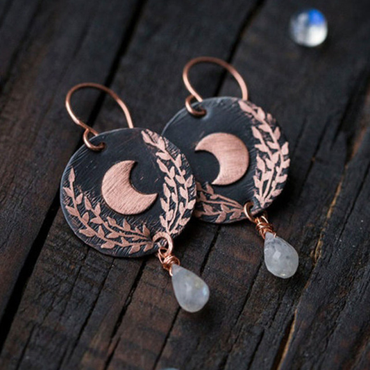 Elegante rosa Mond-Ohrstecker