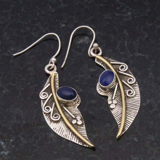 Exquisite Vintage-Ohrhänger mit funkelndem blauen Kristallblatt