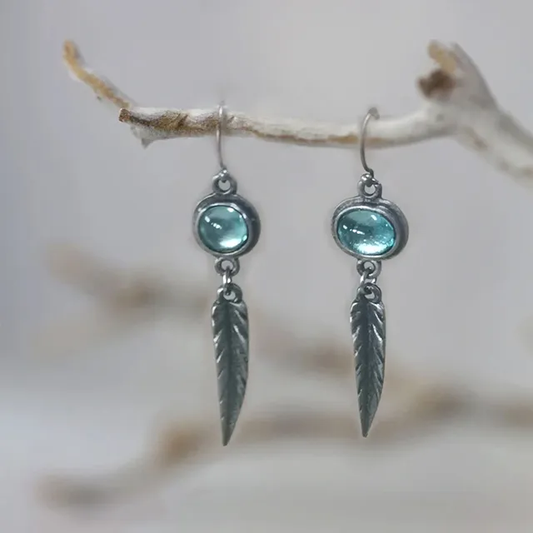 Elegante Vintage-Ohrringe mit blauen Kristallfedern