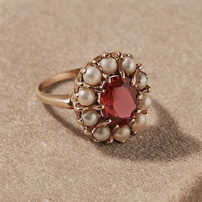 Eleganter roter Kristallring mit zeitlosen Vintage-Perlen