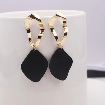 Elegante Vintage-Ohrringe in Schwarz und Gold