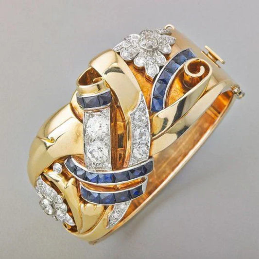 Eleganter Vintage Goldring mit funkelndem blauen Zirkonia